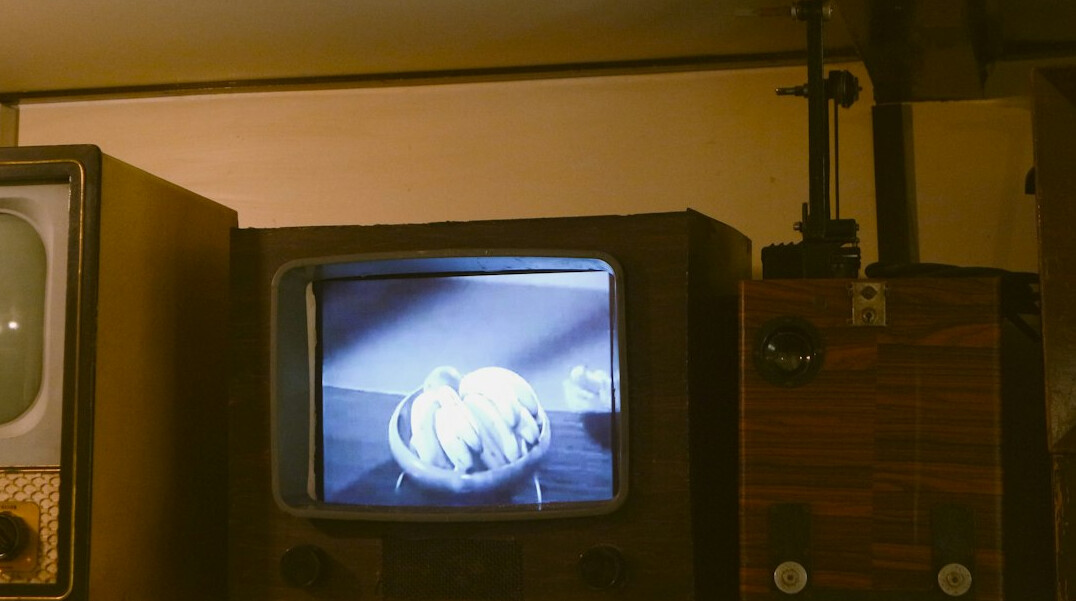 family watching old tv